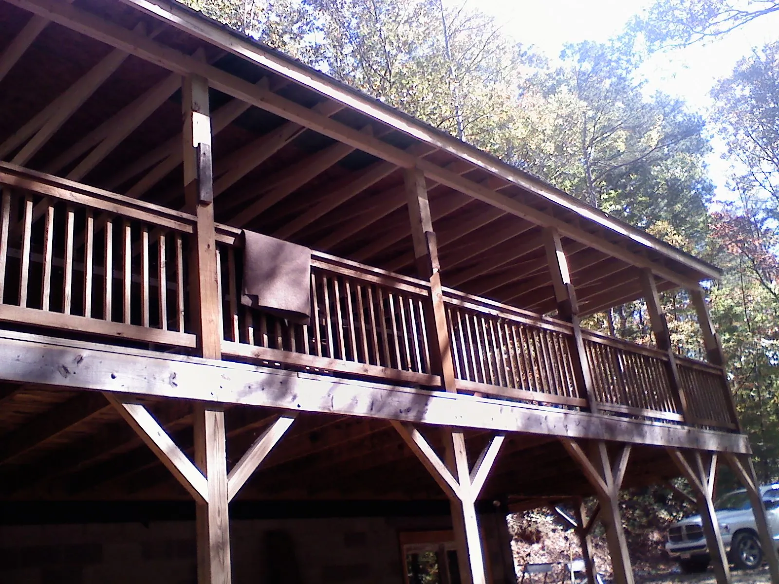 Timber framing under a new elevated porch and deck — Roof Leak Repair in Philo by Roofing Brothers